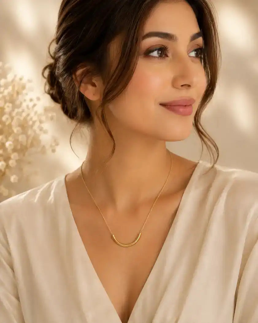Gold Elegant SS Moon Pendant Necklace featuring a minimalist, high-polish curved smile bar pendant suspended from a delicate cable chain.