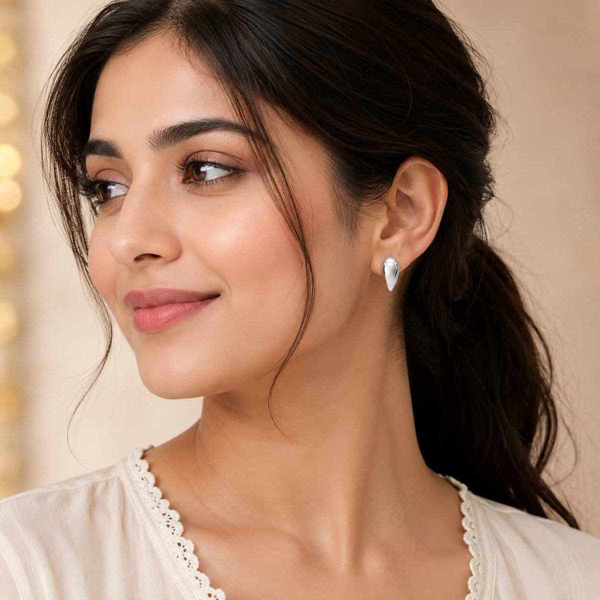 Floral Twist Silver Hoop Earrings